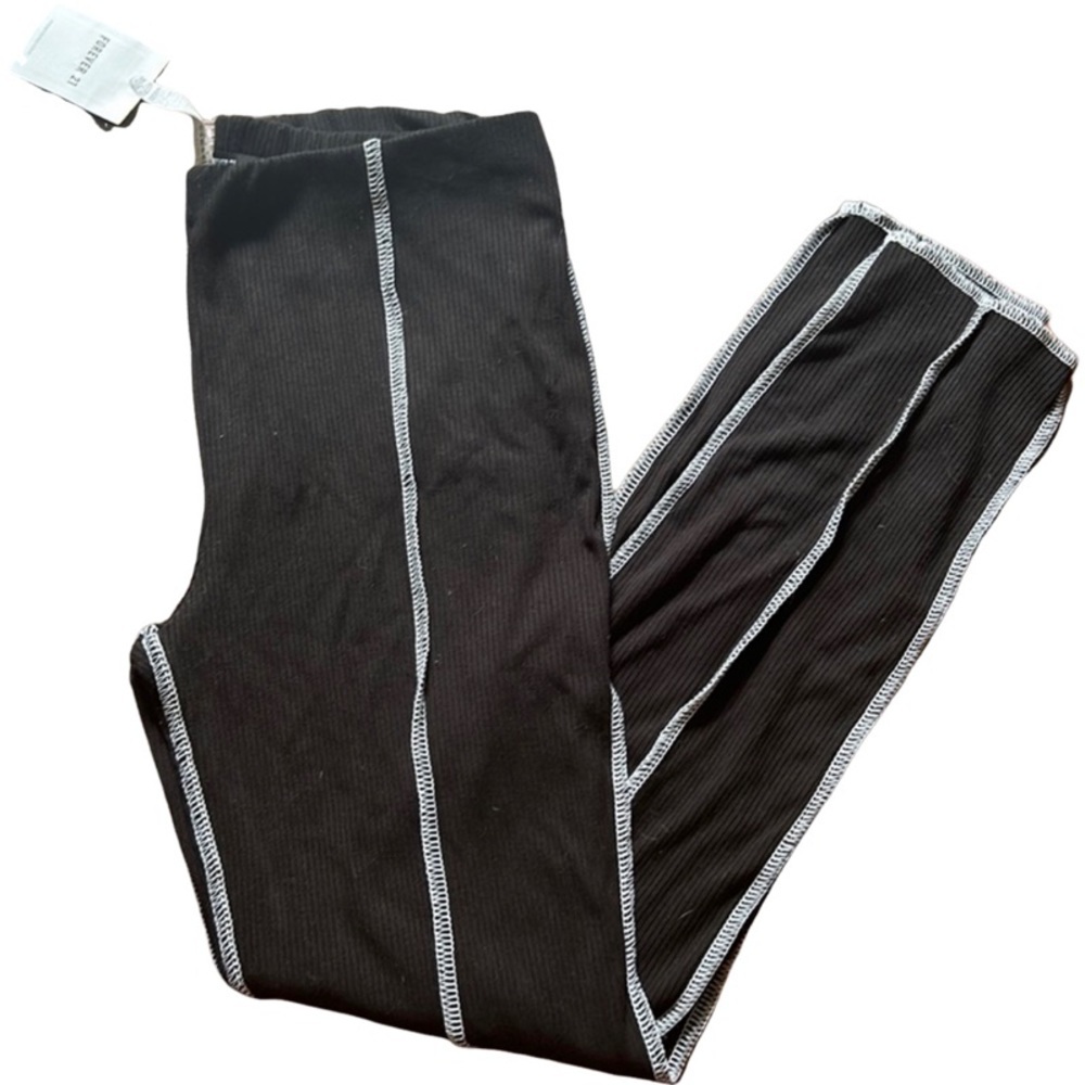 F21 leggings with white line detail down the middle